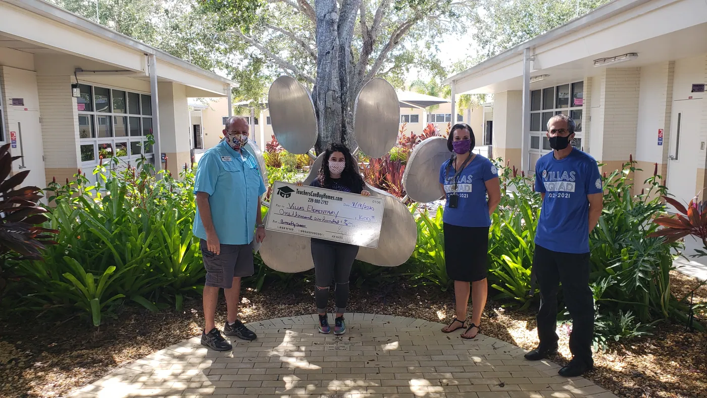 Over $1500 donation given to Villas Elementary!